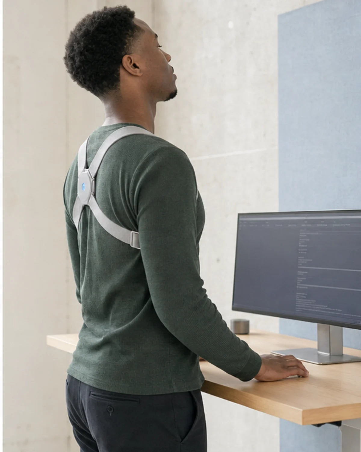 The same man calmly resetting into a more upright position